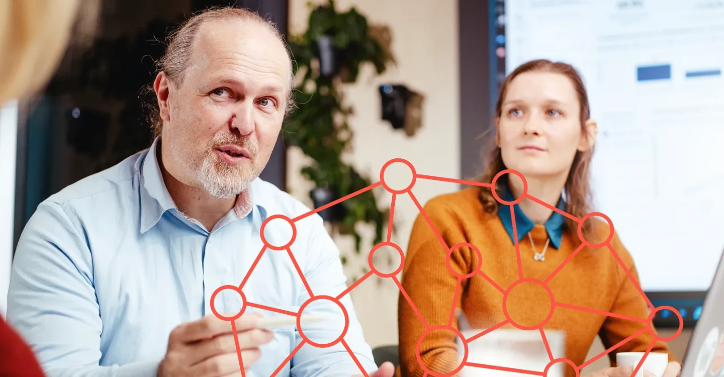 Data & AI-Expert:innen der viadee im Kundengespräch