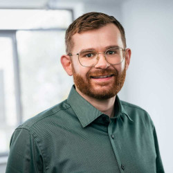 Ein Portrait vom viadee Berater Felix Hechler.